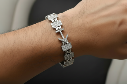 Gold bracelet on a gray background