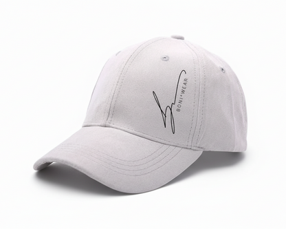 Light gray baseball cap with a brand logo on a white background