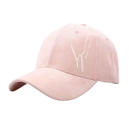 Pink baseball cap with a logo on no background