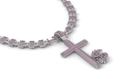 Silver chain with pink gemstones and a cross pendant on a white background