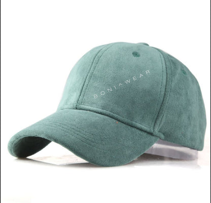 Green baseball cap with 'BONJOWEAR' branding on a white background