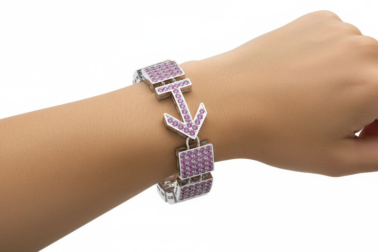 Bracelet with pink gemstones on a wrist against a white background