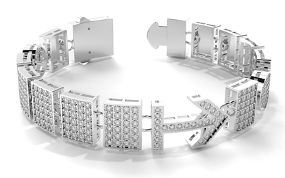 Silver bracelet with diamond accents on a white background