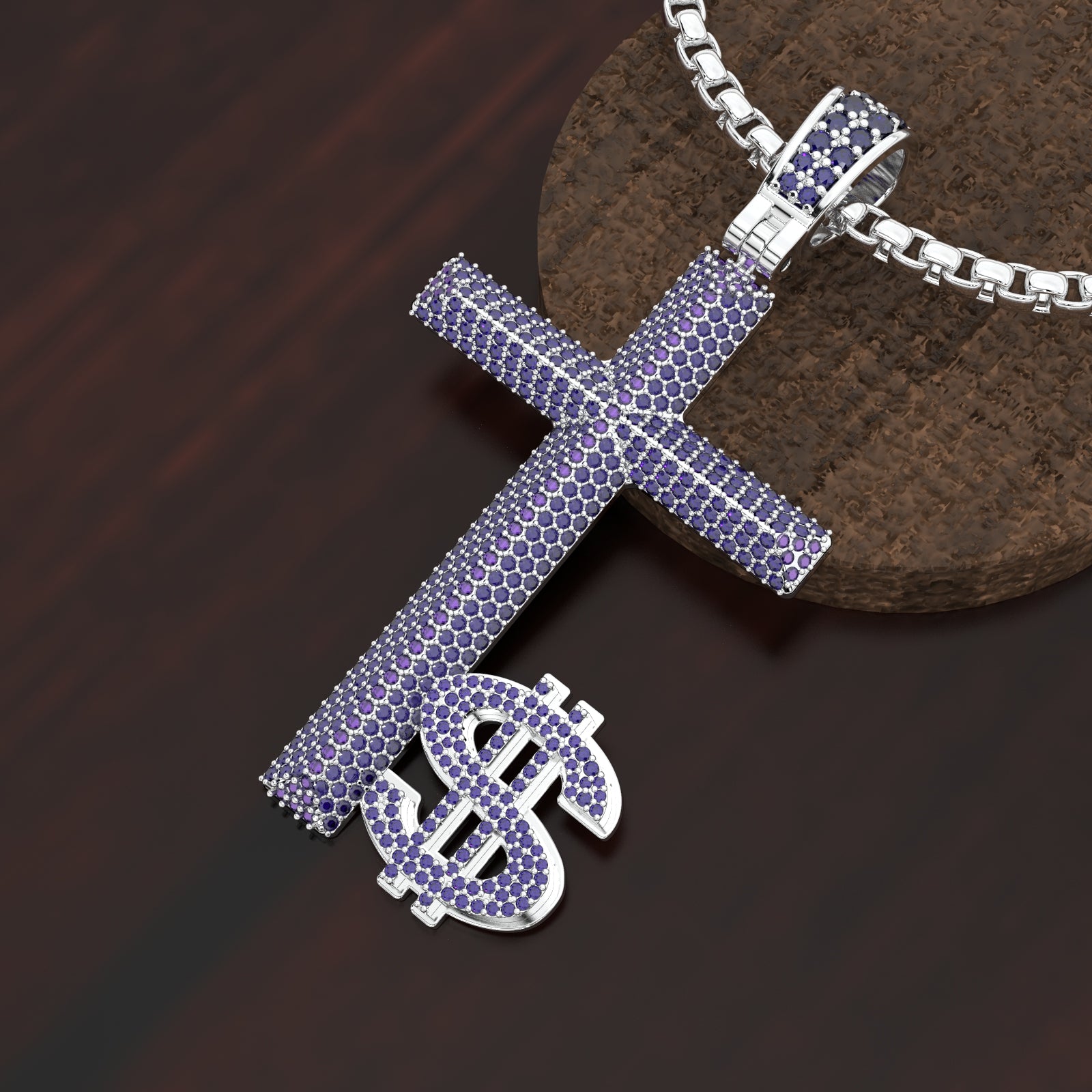 Silver cross and dollar sign pendant with purple stones on a dark background